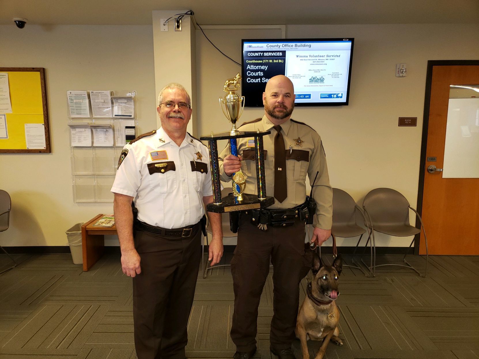 Sheriff Ron Ganrude, Deputy Adam Carlson and K9 Cleo